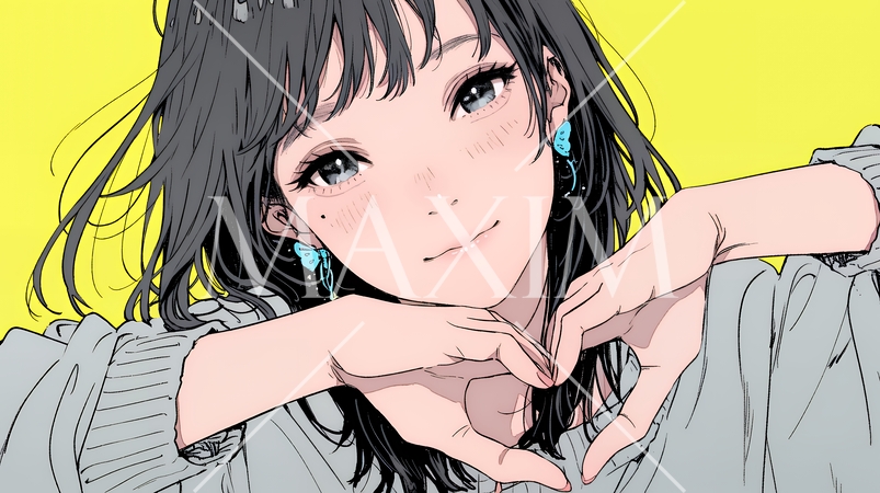 ハートマークを手で作り愛情表現をしている若い女性