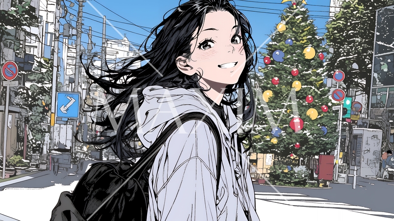 ホワイトクリスマスの街を歩く若い女性