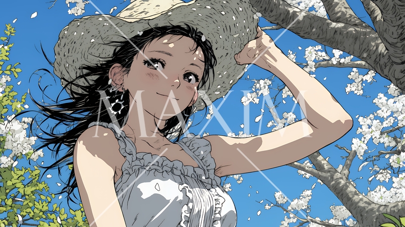 春風に飛ばされそうな帽子を、手で押さえる若い女性