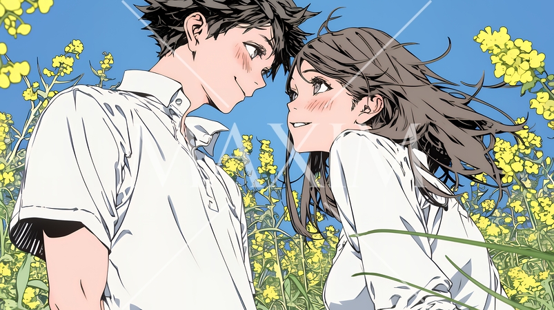 菜の花畑でデートをしている若いカップル