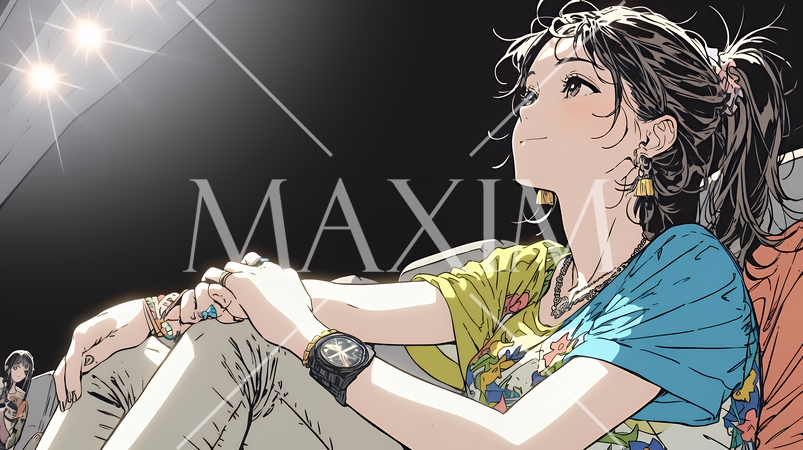 映画や演劇を鑑賞している若い女性