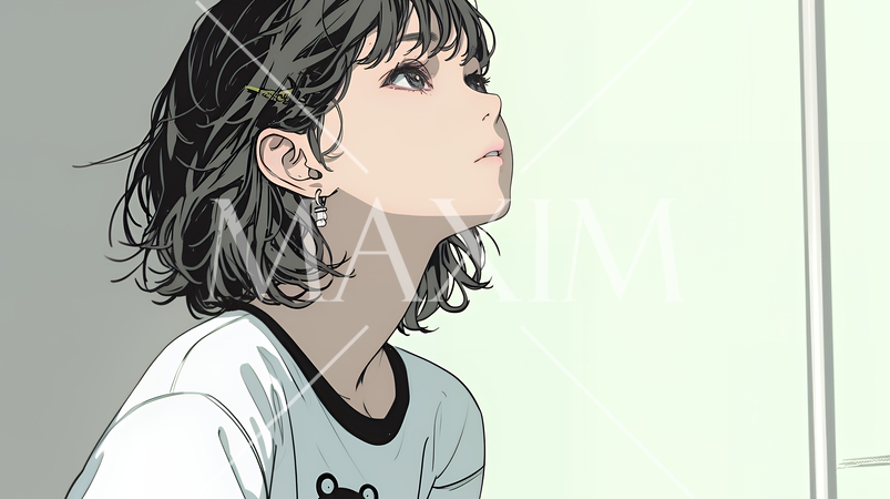 白い壁に向かって考え事をする若い女性