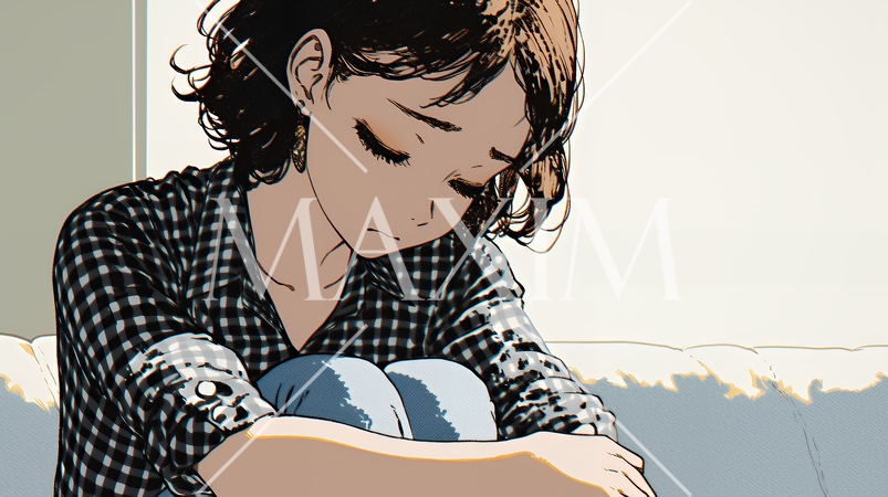 腹痛（生理痛）に苦しむ若い女性