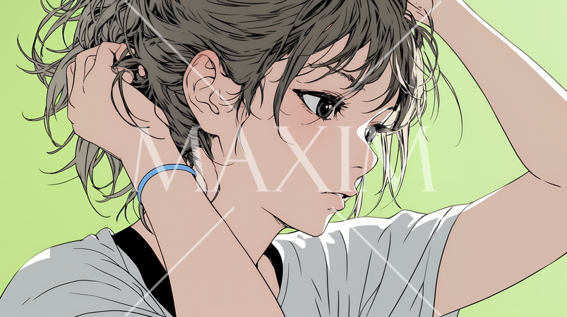 髪をかきあげている（なでている）若い女性