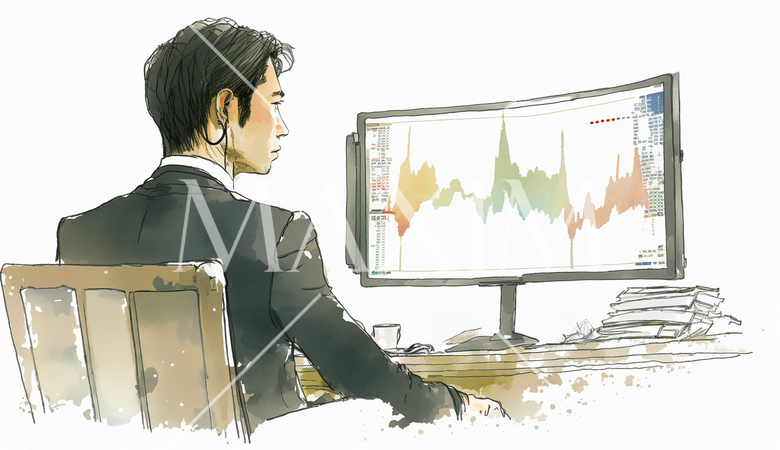 デスクに向かって取引画面を操作する男性トレーダーの横顔。