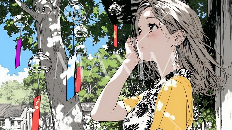 風鈴の音色を聞いている若い女性