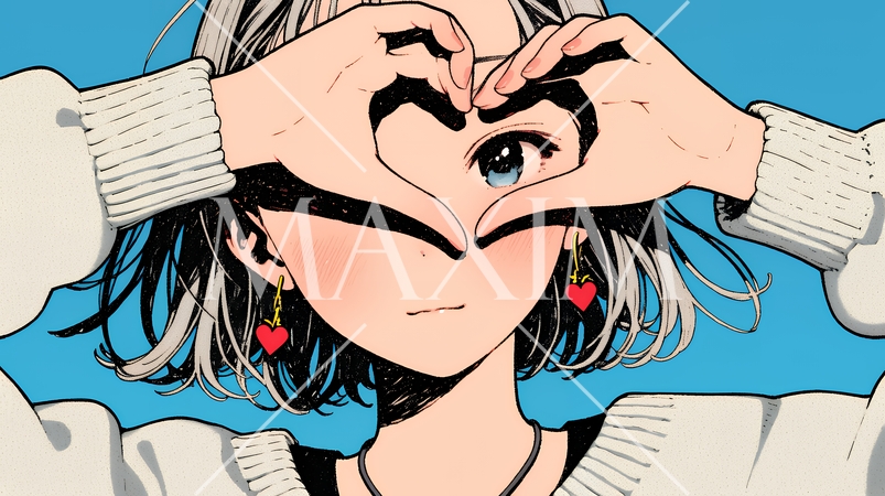 ハートマークを手で作り愛情表現をしている若い女性