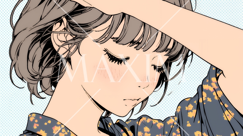 髪をかきあげている（なでている）若い女性