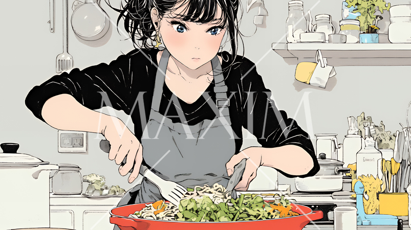 なれない料理に奮闘中の若い女性