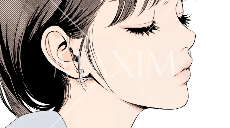 楽：リラックスした顔をしている若い女性