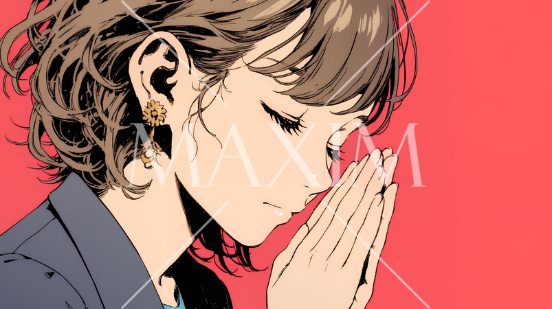 手を合わせてお祈りをしている若い女性