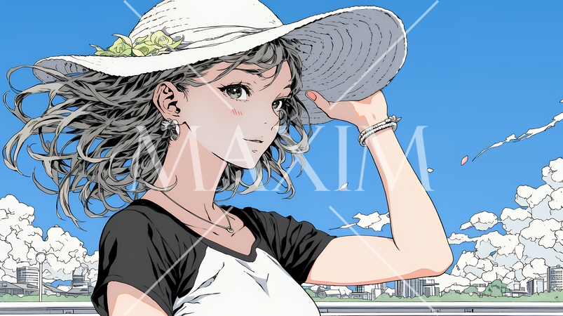 春風に飛ばされそうな帽子を、手で押さえる若い女性