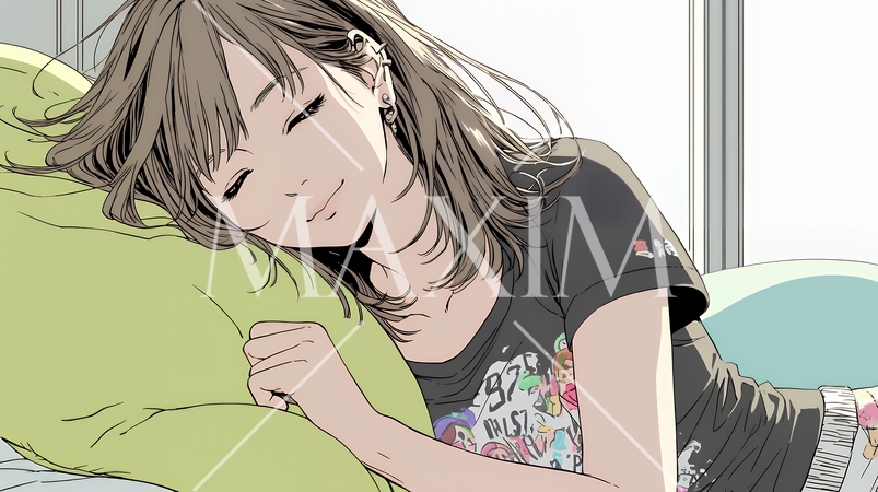 幸せそうな寝顔で眠っている若い女性