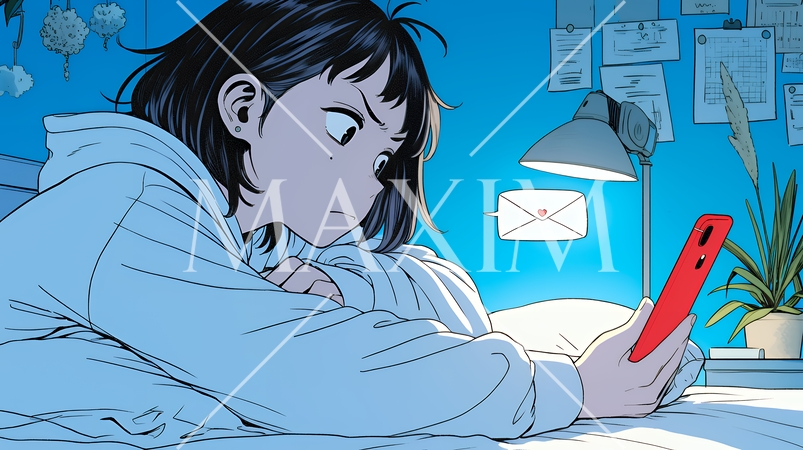 寝ようとしているときに嫌なメールを受け取り、不快そうな若い女性