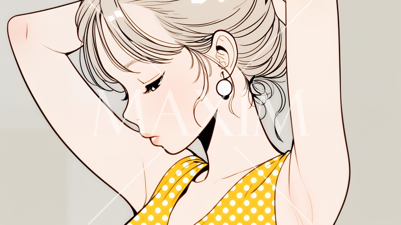 髪をかきあげている（なでている）若い女性