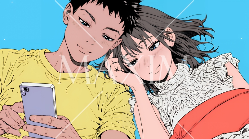 幸せそうに一緒にスマホを見る若いカップル