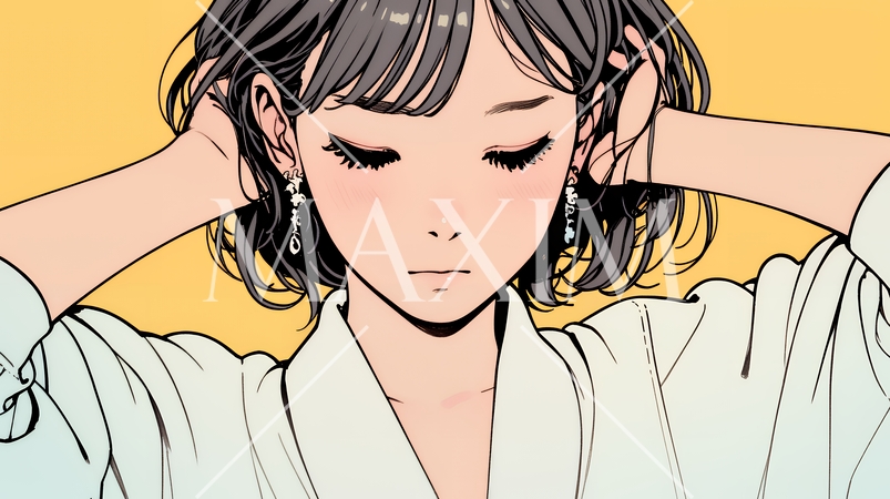 髪をかきあげている（なでている）若い女性